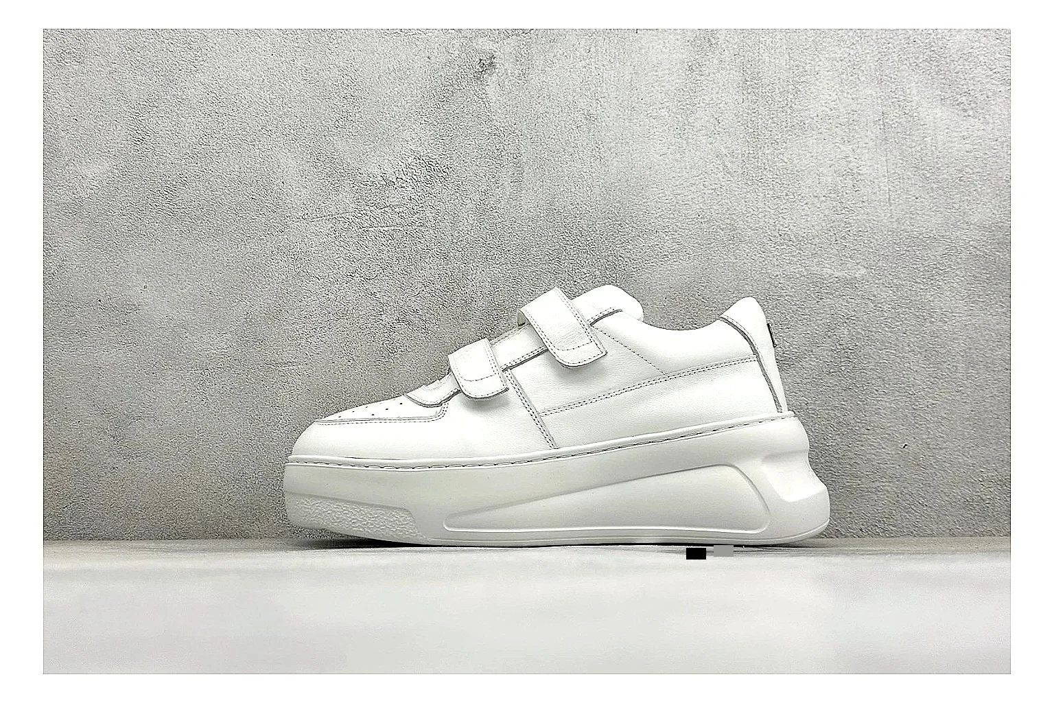 Acne Studios Velcro White Mid-Top comparison image with white leather panels, broad hook-and-loop straps, padded mid-top collar, and a clean rubber sole