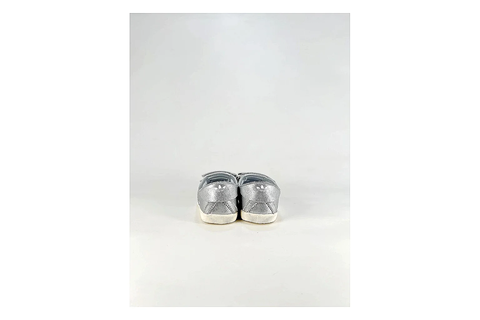 Adidas Originals Anfisa Silver Sneakers comparison signal photo with silver low-top sneakers with leather texture, side-profile shape, upper panel lines, and outsole detail thumbnail 3