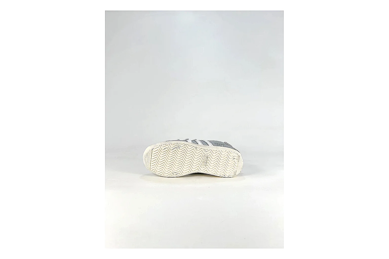 Adidas Originals Anfisa Silver Sneakers comparison signal photo with silver low-top sneakers with leather texture, side-profile shape, upper panel lines, and outsole detail thumbnail 4