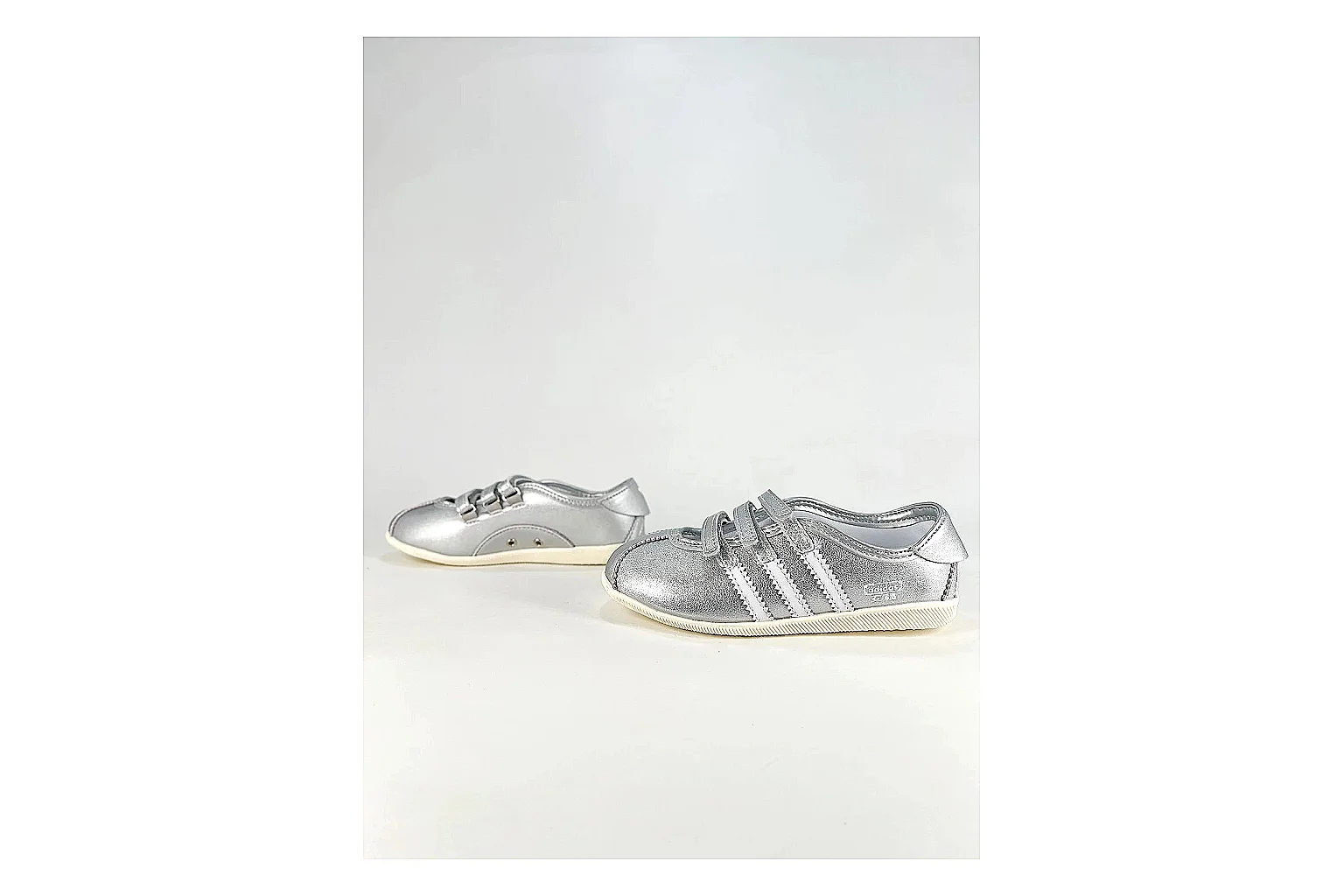 Adidas Originals Anfisa Silver Sneakers comparison signal photo with silver low-top sneakers with leather texture, side-profile shape, upper panel lines, and outsole detail thumbnail 5