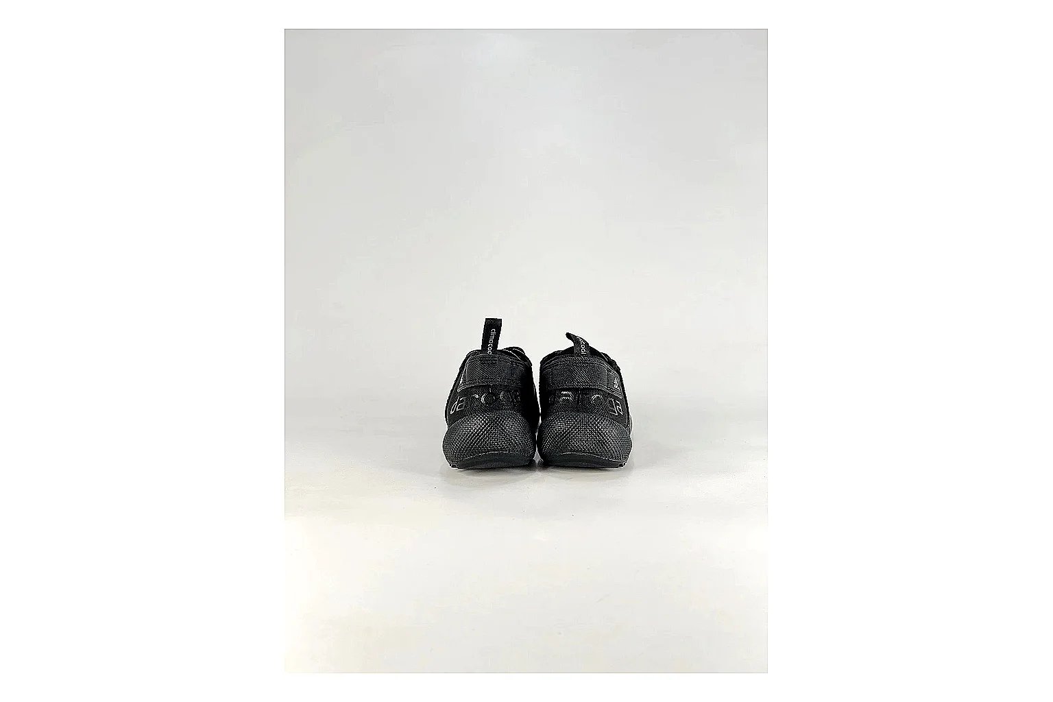 Adidas Originals Daroga Black White Sneakers comparison signal photo with black white low-top sneakers with mesh texture, side-profile shape, upper panel lines, and outsole detail thumbnail 3