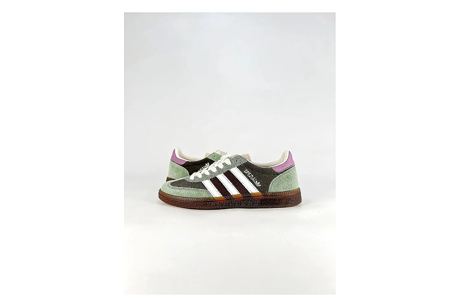 Adidas Originals Handball Spezial Green Brown Sneakers comparison signal photo with green brown handball sneakers with suede-leather texture, side-profile shape, upper panel lines, and outsole detail
