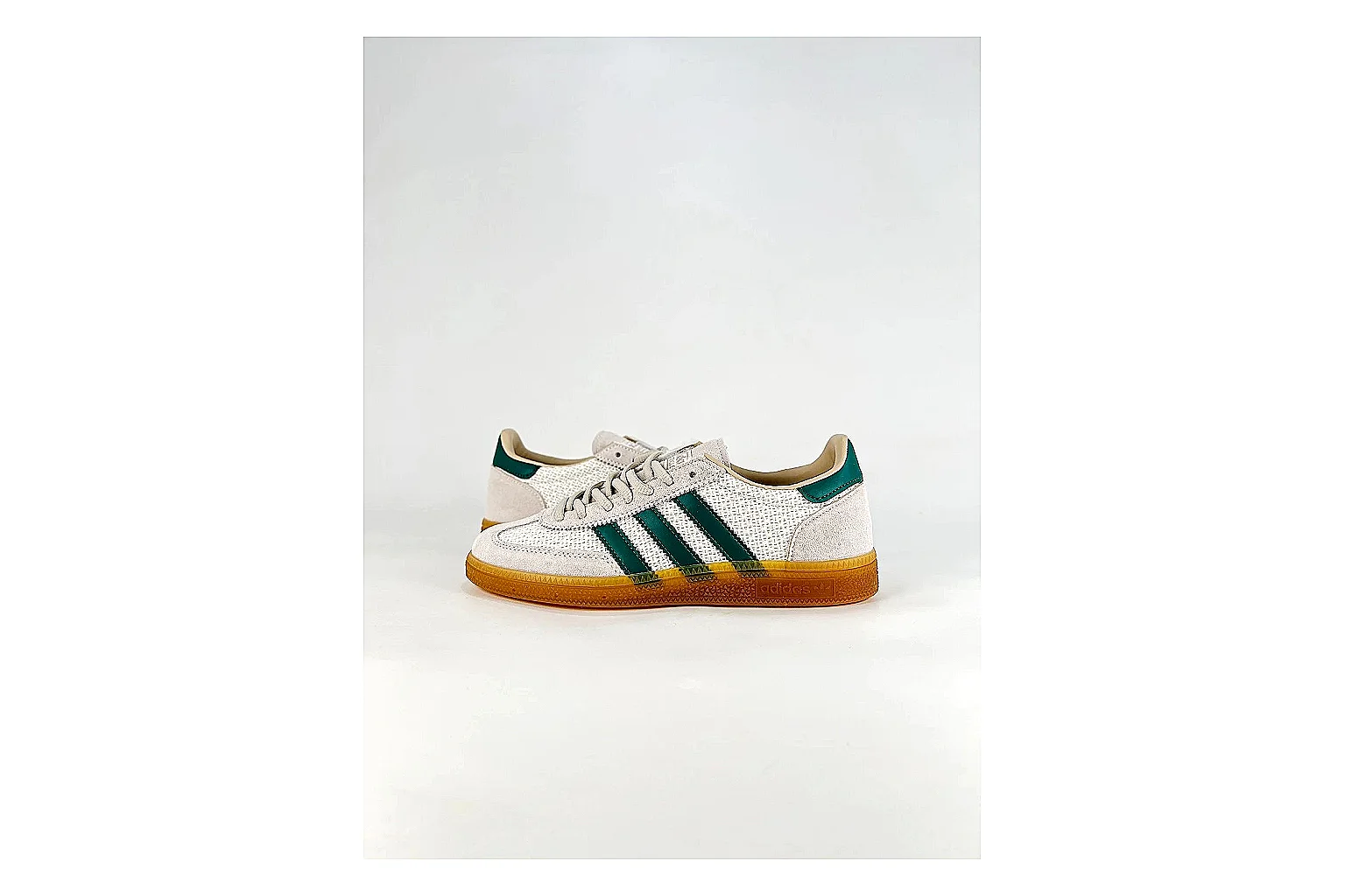 Adidas Originals Handball Spezial White Green Sneakers comparison signal photo with white green handball sneakers with suede-leather texture, side-profile shape, upper panel lines, and outsole detail