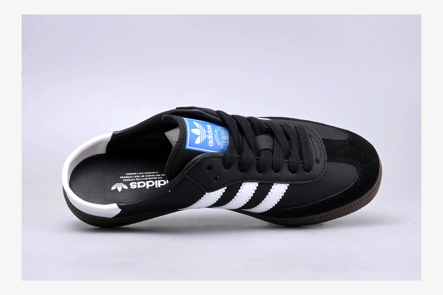 Adidas Originals Samba Black White comparison signal photo with white black low-top sneaker with mixed-material upper and low-profile shape
