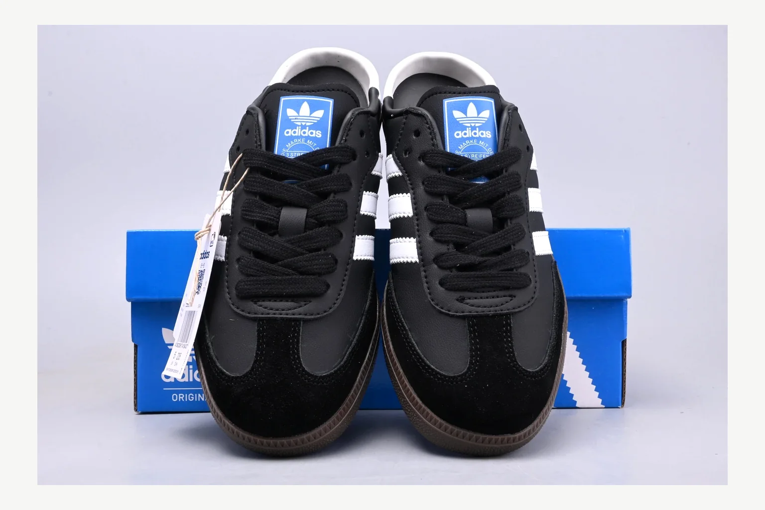 Adidas Originals Samba Black White comparison signal photo with white black low-top sneaker with mixed-material upper and low-profile shape thumbnail 4