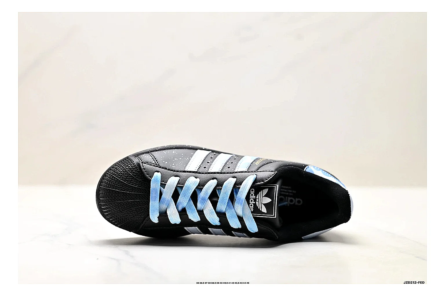 Adidas Originals Samba Black Blue Sneakers comparison signal photo with black blue terrace sneakers with leather texture, side-profile shape, upper panel lines, and outsole detail thumbnail 2