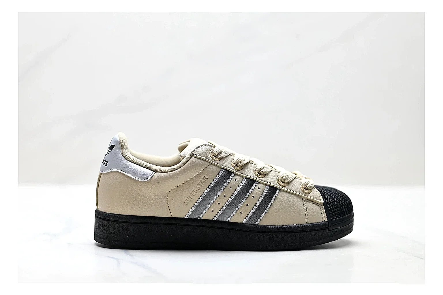 Adidas Originals Samba Cream Black Sneakers comparison signal photo with cream black terrace sneakers with leather texture, side-profile shape, upper panel lines, and outsole detail