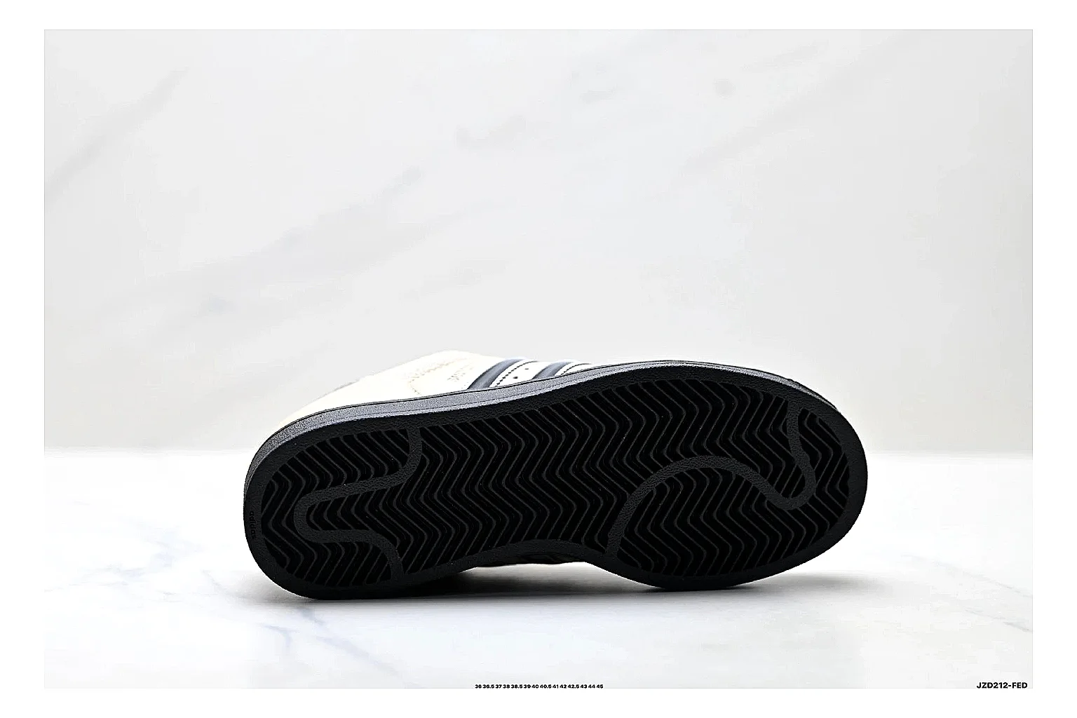 Adidas Originals Samba Cream Black Sneakers comparison signal photo with cream black terrace sneakers with leather texture, side-profile shape, upper panel lines, and outsole detail thumbnail 4