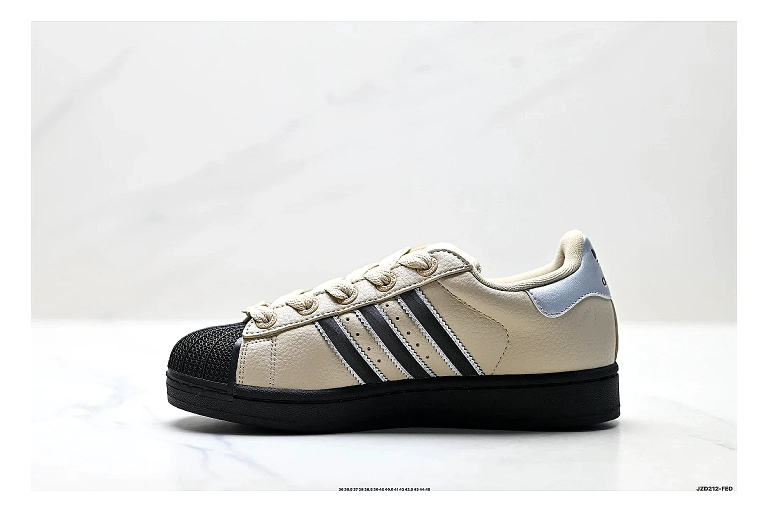 Adidas Originals Samba Cream Black Sneakers comparison signal photo with cream black terrace sneakers with leather texture, side-profile shape, upper panel lines, and outsole detail thumbnail 6