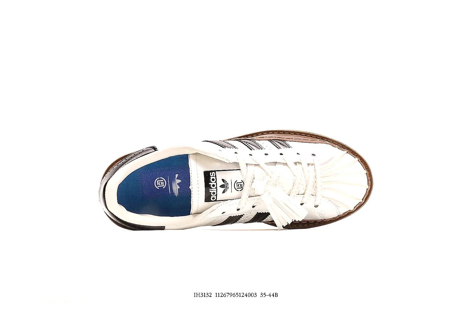 Adidas 0399 white platform low top with black stripes and brown welt