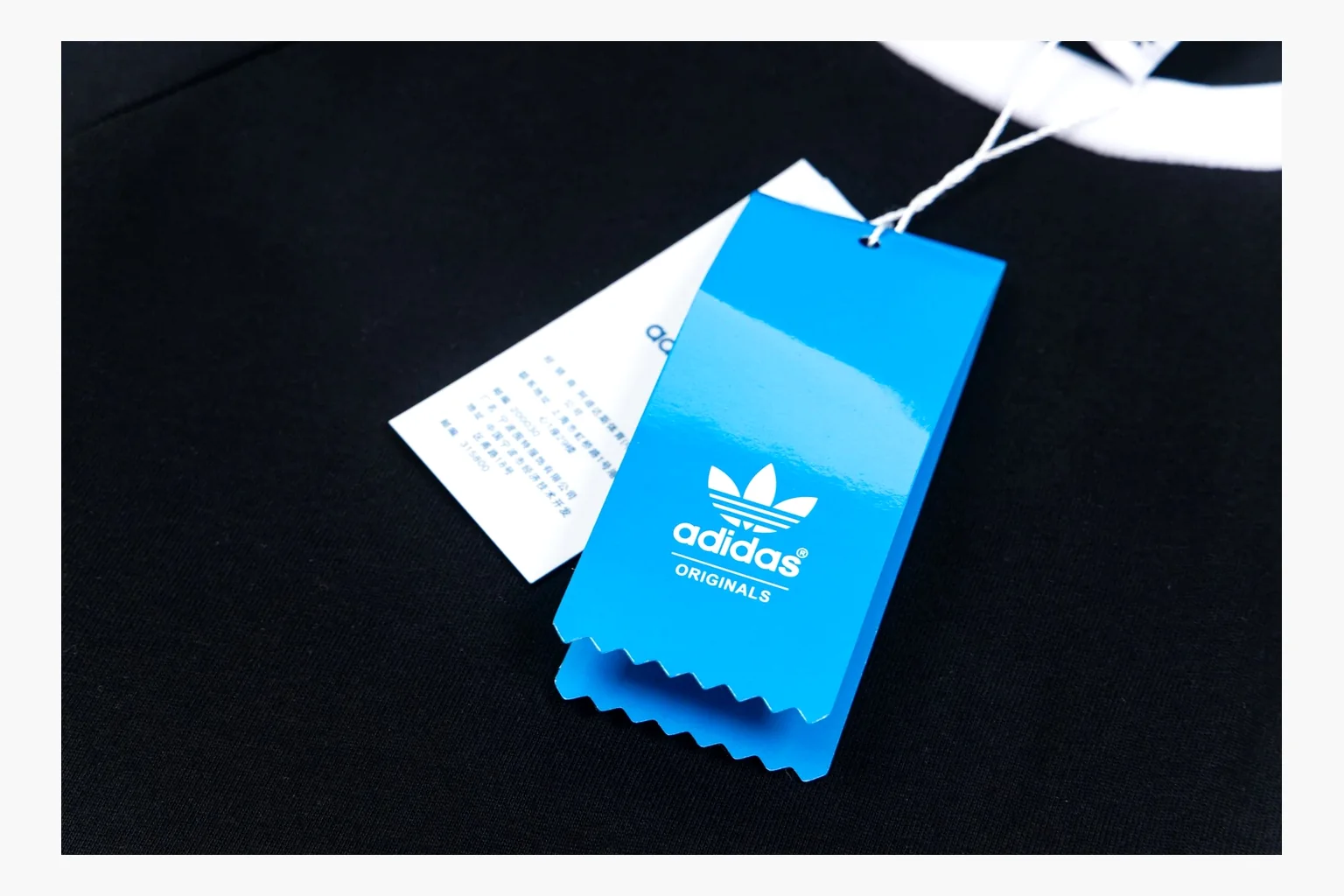 Adidas black white ringer tee comparison image with trefoil thumbnail 3