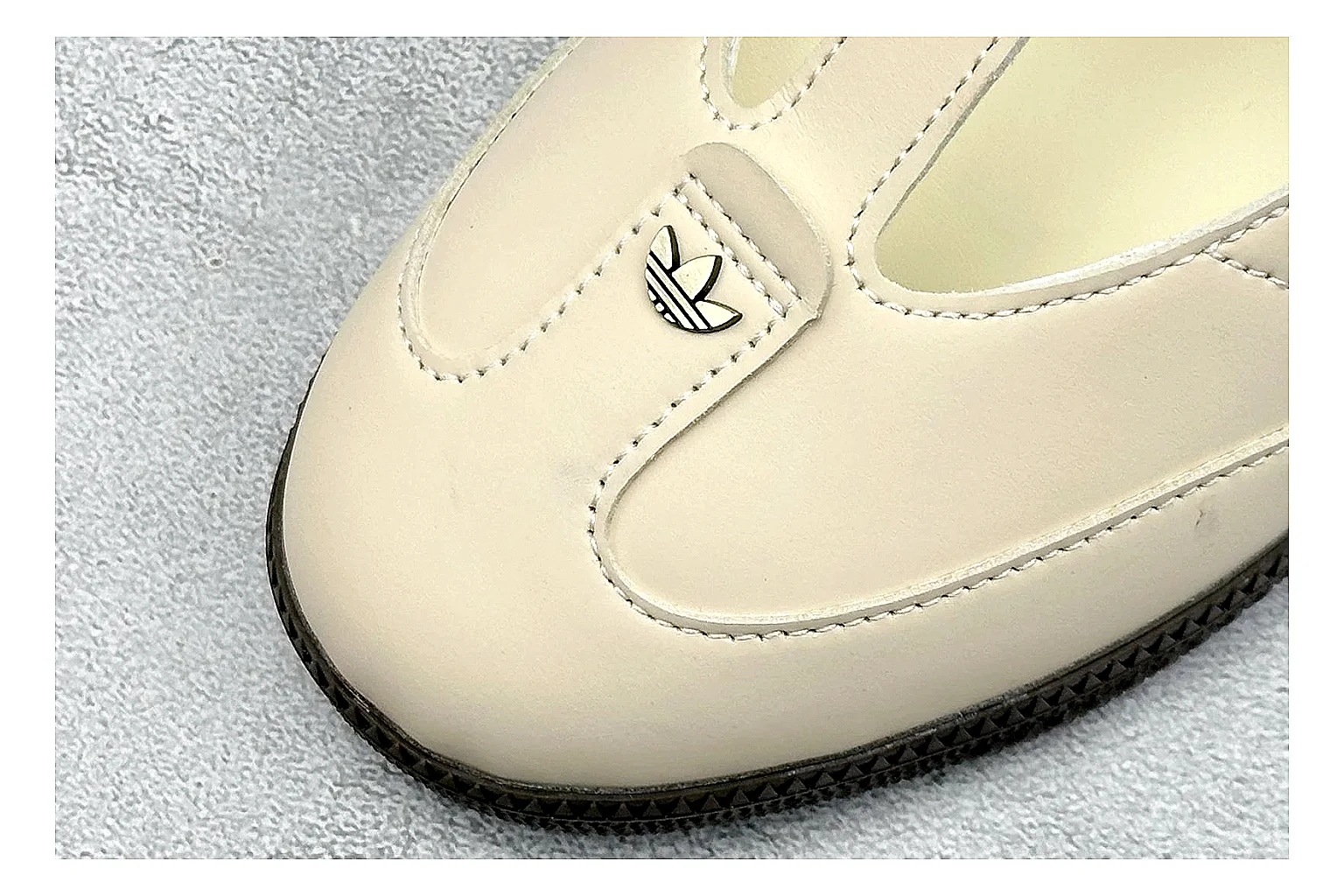 Adidas Samba Jane Cream comparison photo showing cream Mary Jane upper, dark gum outsole, Samba-style side stripes, and low strap silhouette thumbnail 5