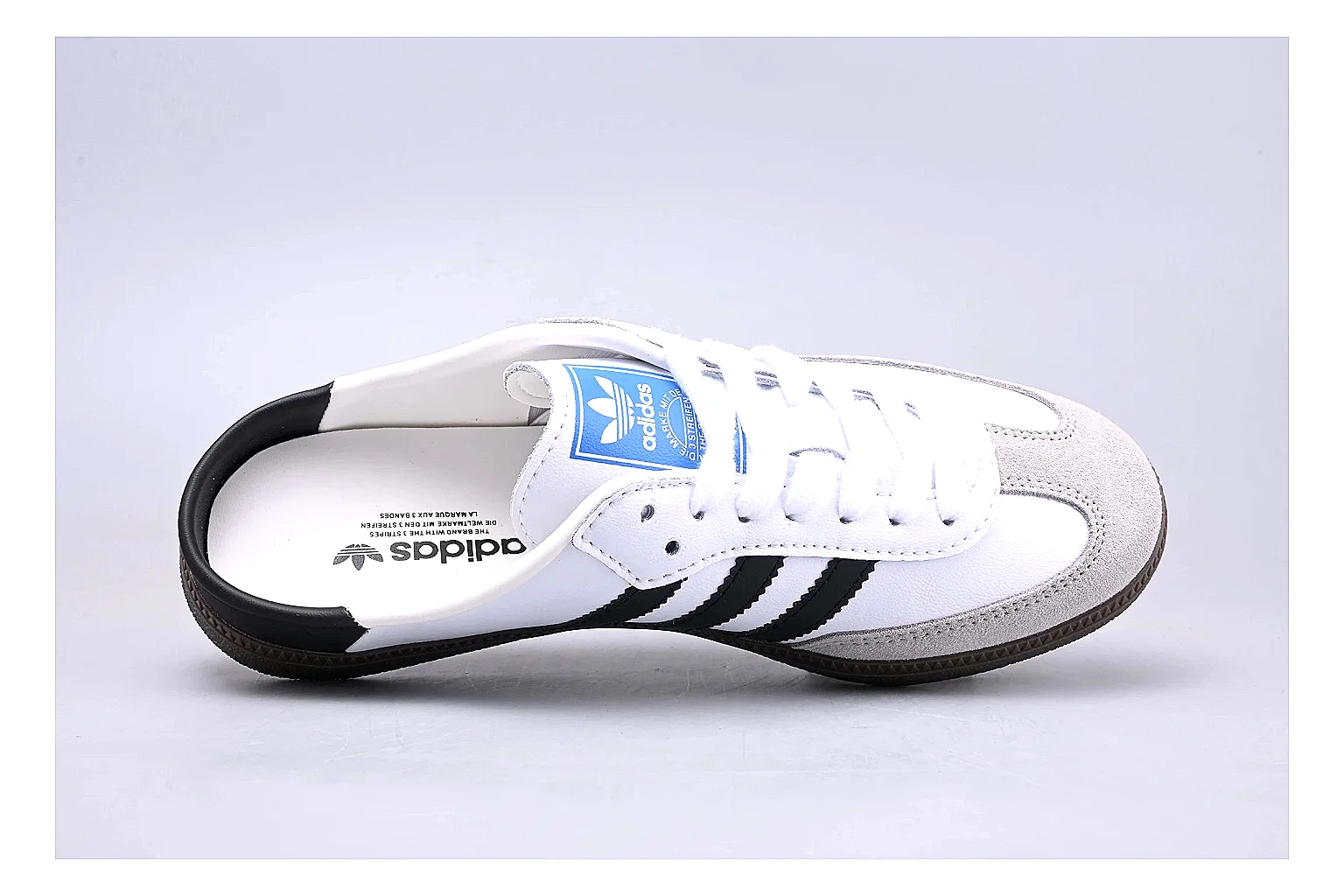 Adidas Samba OG White Black comparison signal photo with white black samba og terrace sneaker with mixed upper and terrace shape thumbnail 2