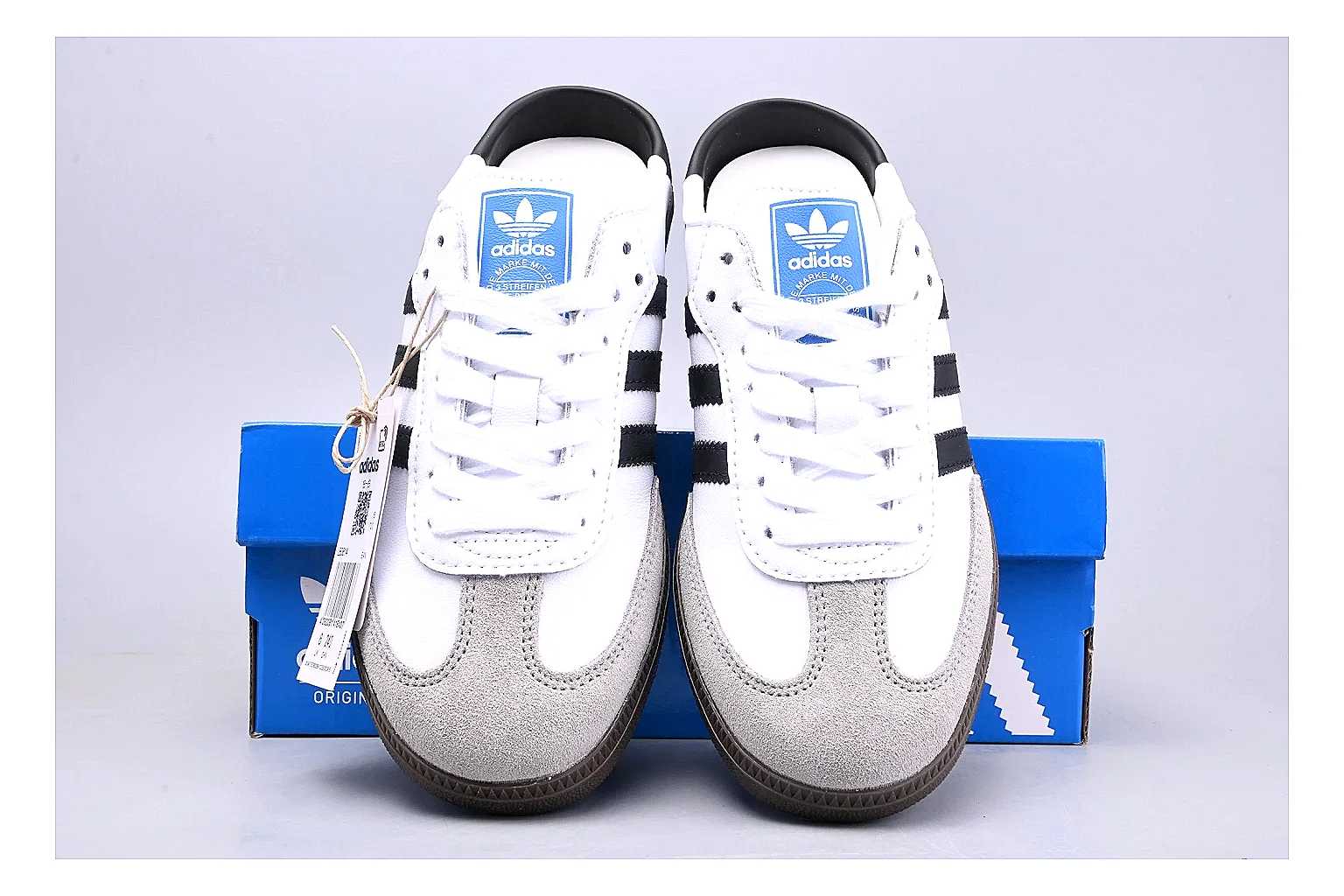 Adidas Samba OG White Black comparison signal photo with white black samba og terrace sneaker with mixed upper and terrace shape thumbnail 4