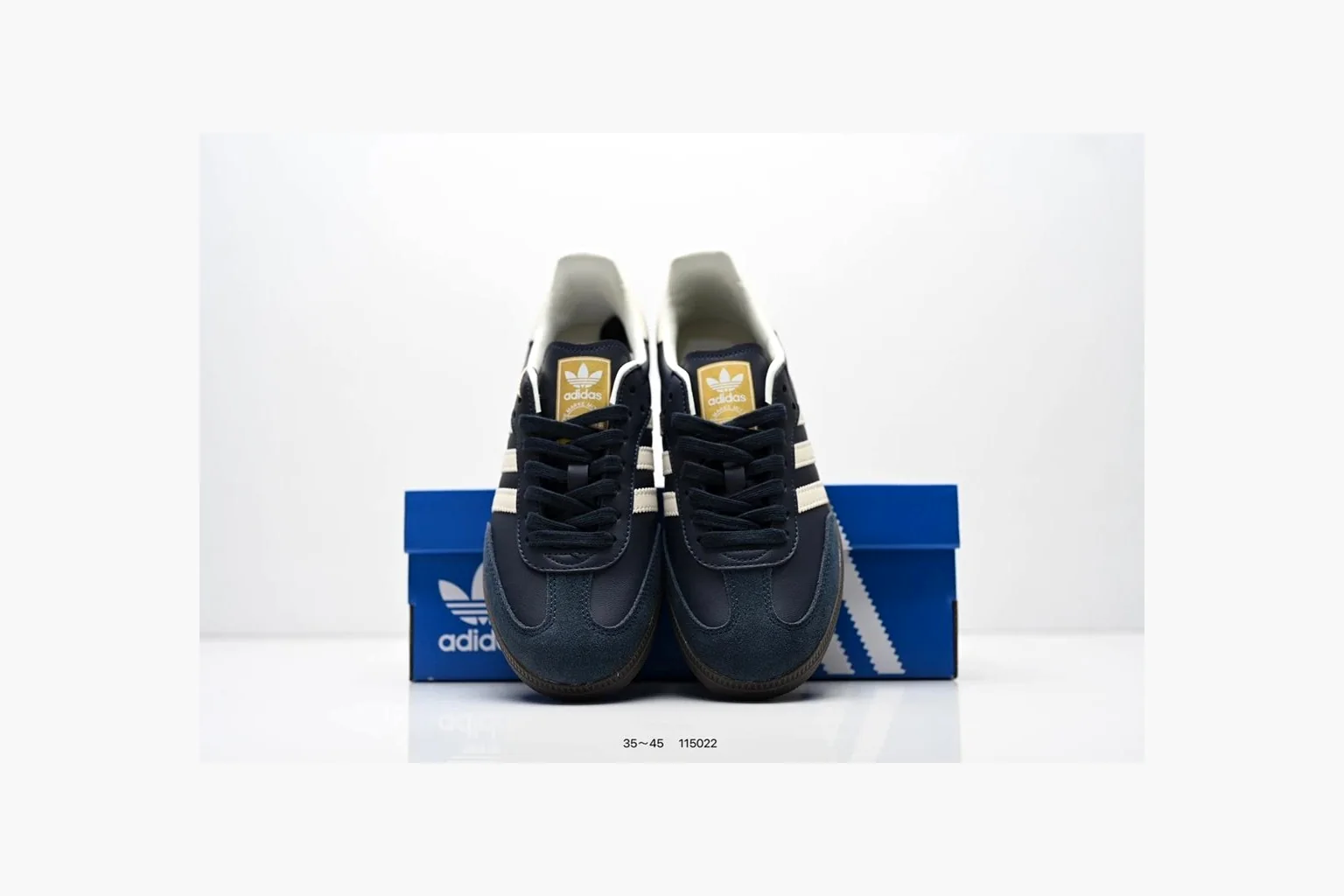 Adidas Samba OG Black White Gold comparison photo showing black leather-suede low-top upper, white three stripes, gold tongue label, gum sole, and classic Samba side profile thumbnail 5