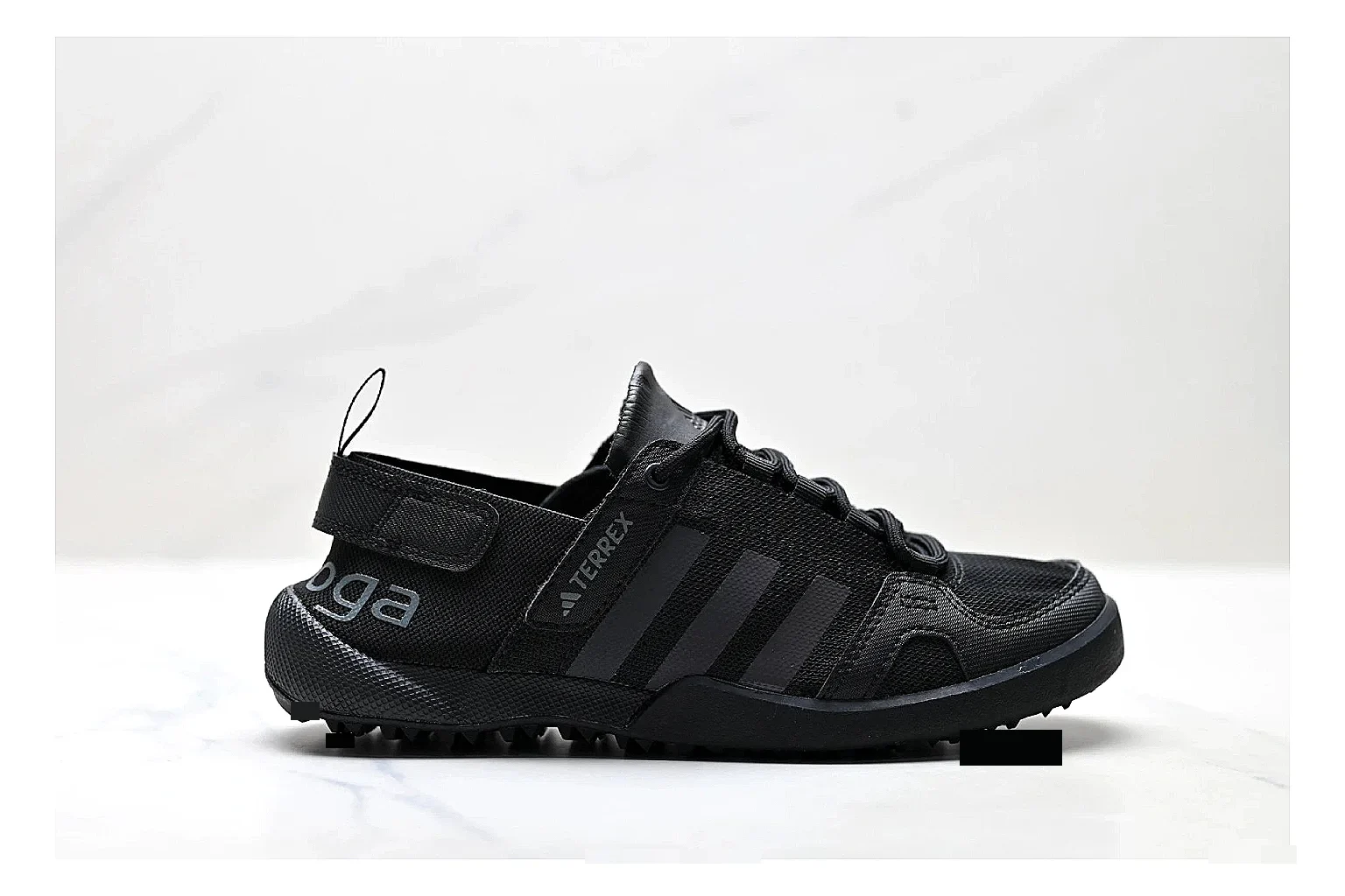 Adidas Terrex Daroga Black Sneakers comparison signal photo with black outdoor trail sneakers with mesh texture, side-profile shape, upper panel lines, and outsole detail