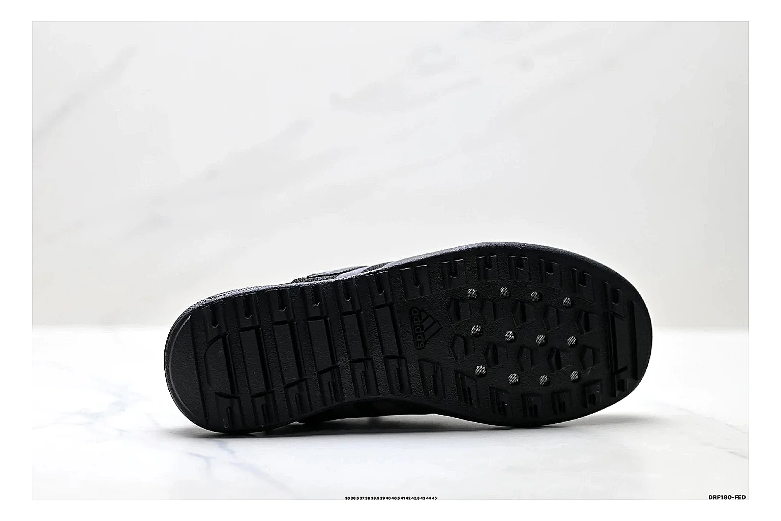 Adidas Terrex Daroga Black Sneakers comparison signal photo with black outdoor trail sneakers with mesh texture, side-profile shape, upper panel lines, and outsole detail thumbnail 4