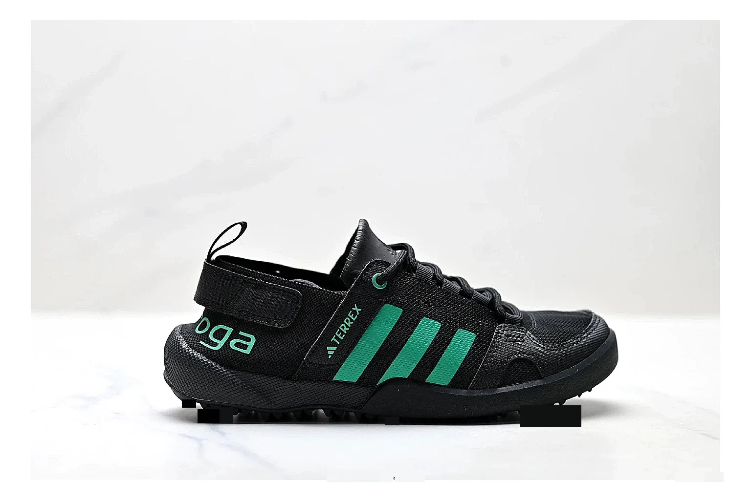 Adidas Terrex Daroga Black Green Sneakers comparison signal photo with black green outdoor trail sneakers with mesh texture, side-profile shape, upper panel lines, and outsole detail