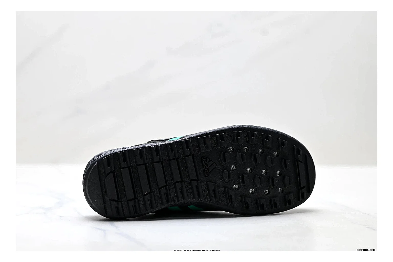 Adidas Terrex Daroga Black Green Sneakers comparison signal photo with black green outdoor trail sneakers with mesh texture, side-profile shape, upper panel lines, and outsole detail thumbnail 4