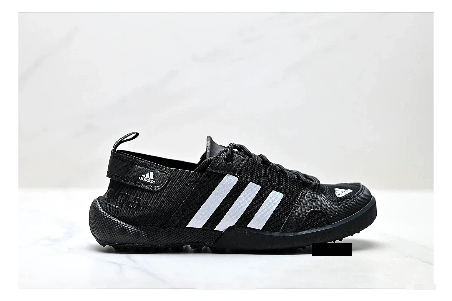 Adidas Terrex Daroga Black White Sneakers comparison signal photo with black white outdoor trail sneakers with mesh texture, side-profile shape, upper panel lines, and outsole detail