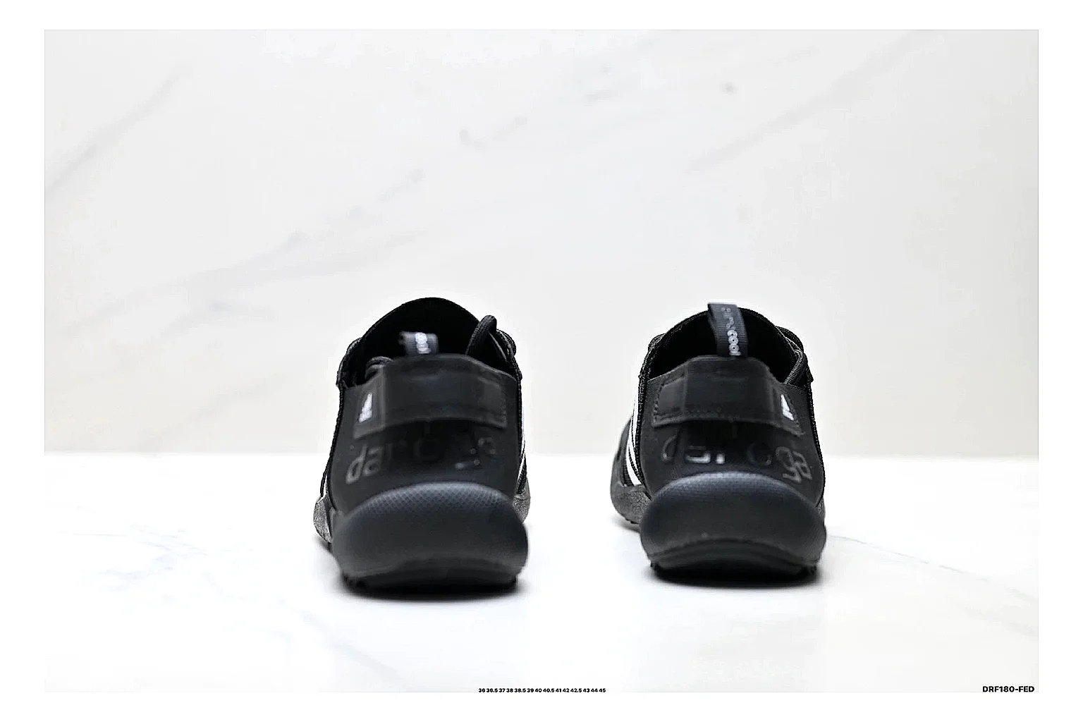 Adidas Terrex Daroga Black White Sneakers comparison signal photo with black white outdoor trail sneakers with mesh texture, side-profile shape, upper panel lines, and outsole detail thumbnail 3