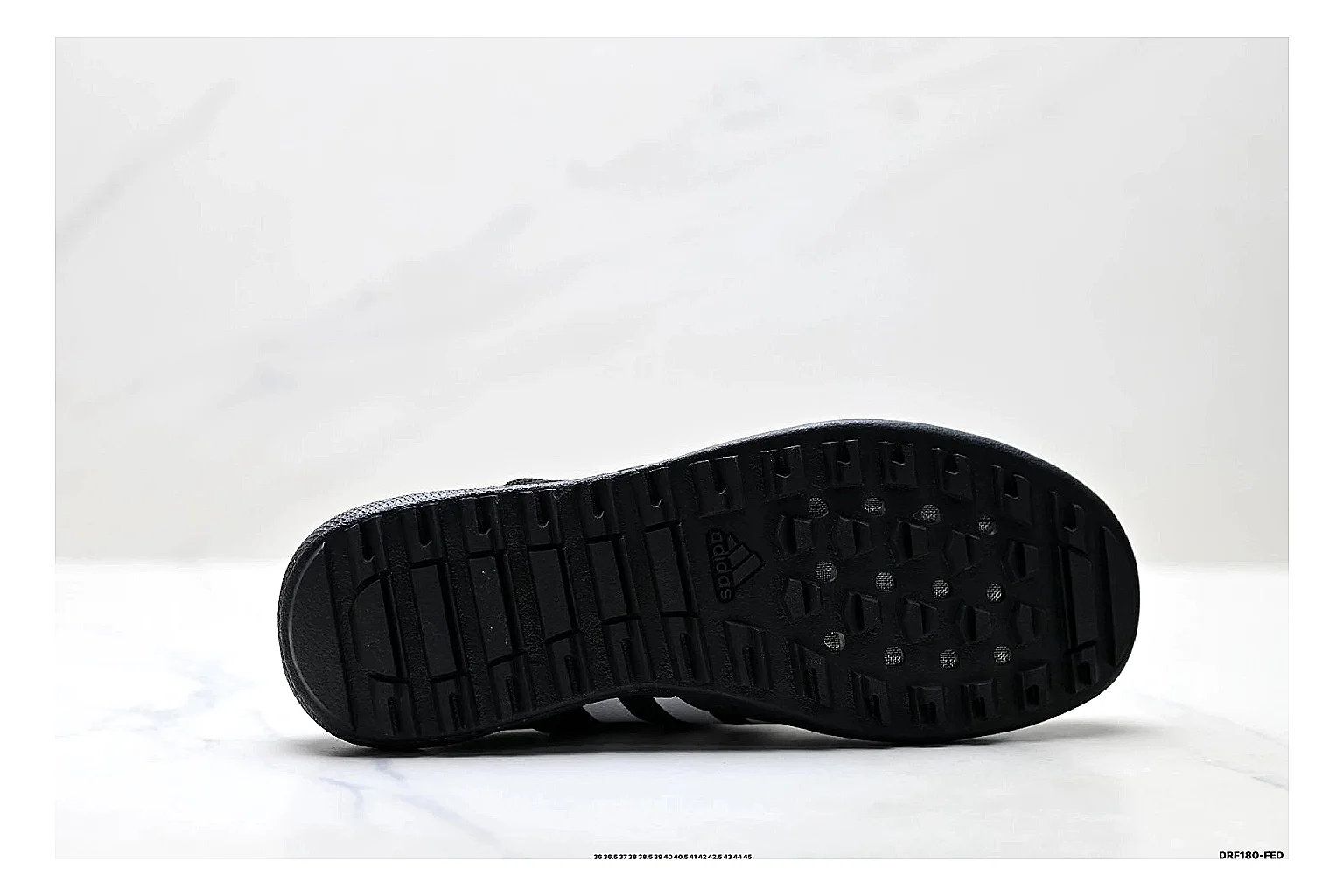 Adidas Terrex Daroga Black White Sneakers comparison signal photo with black white outdoor trail sneakers with mesh texture, side-profile shape, upper panel lines, and outsole detail thumbnail 4