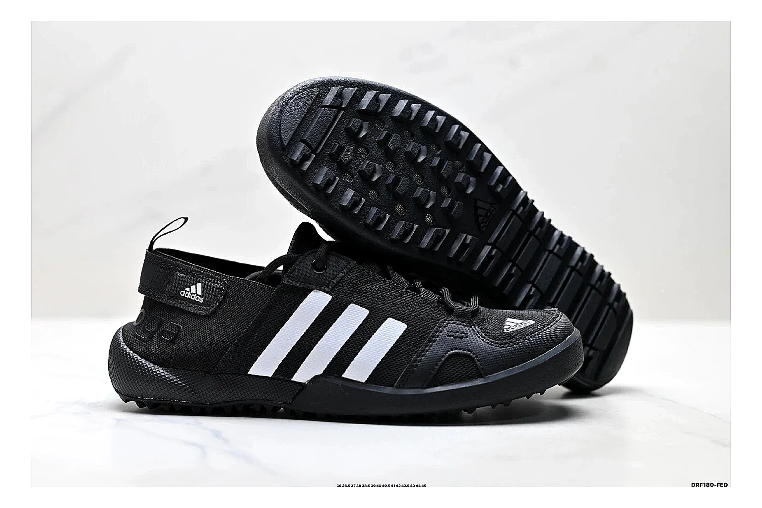 Adidas Terrex Daroga Black White Sneakers comparison signal photo with black white outdoor trail sneakers with mesh texture, side-profile shape, upper panel lines, and outsole detail thumbnail 5