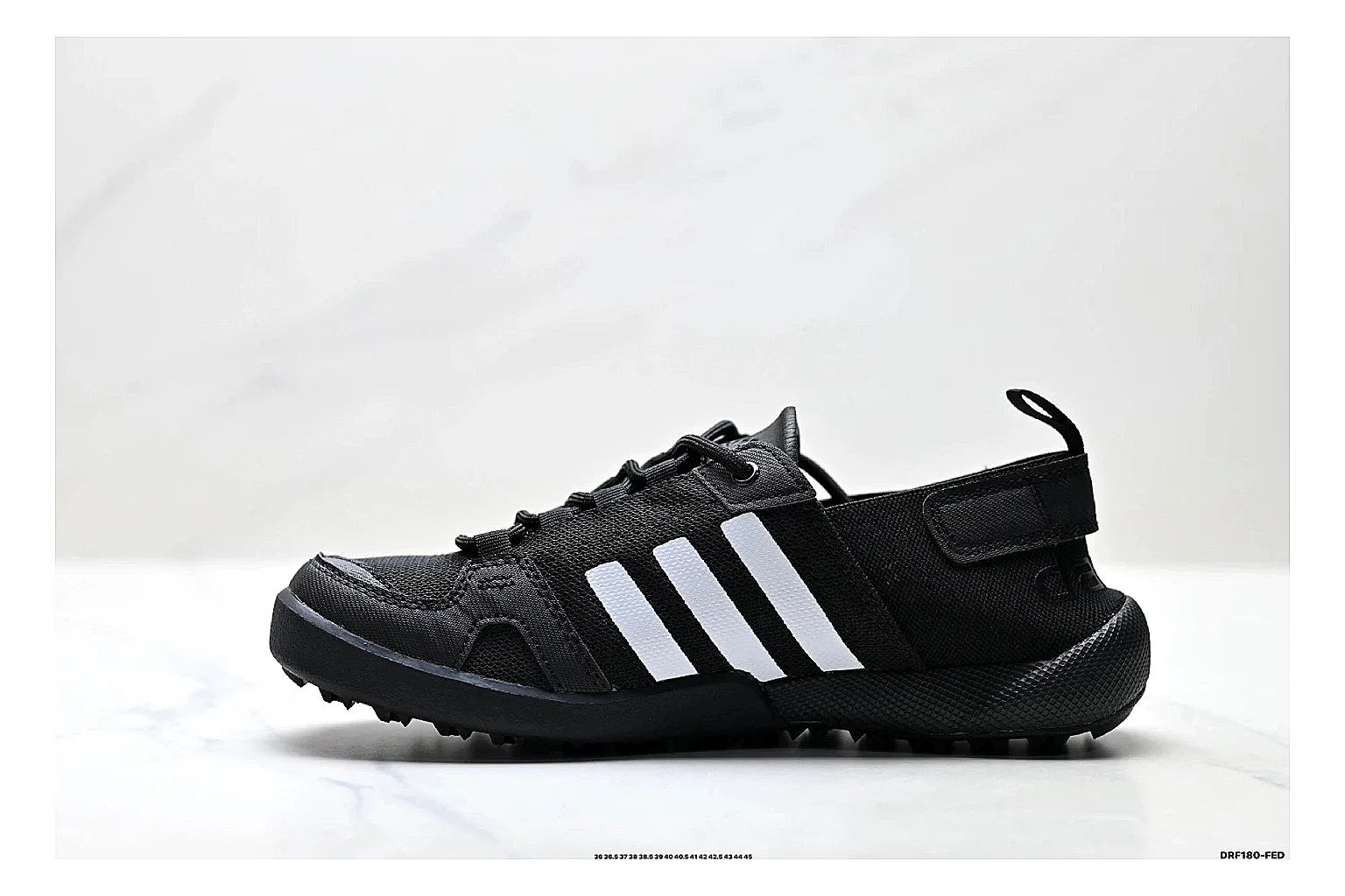 Adidas Terrex Daroga Black White Sneakers comparison signal photo with black white outdoor trail sneakers with mesh texture, side-profile shape, upper panel lines, and outsole detail thumbnail 6