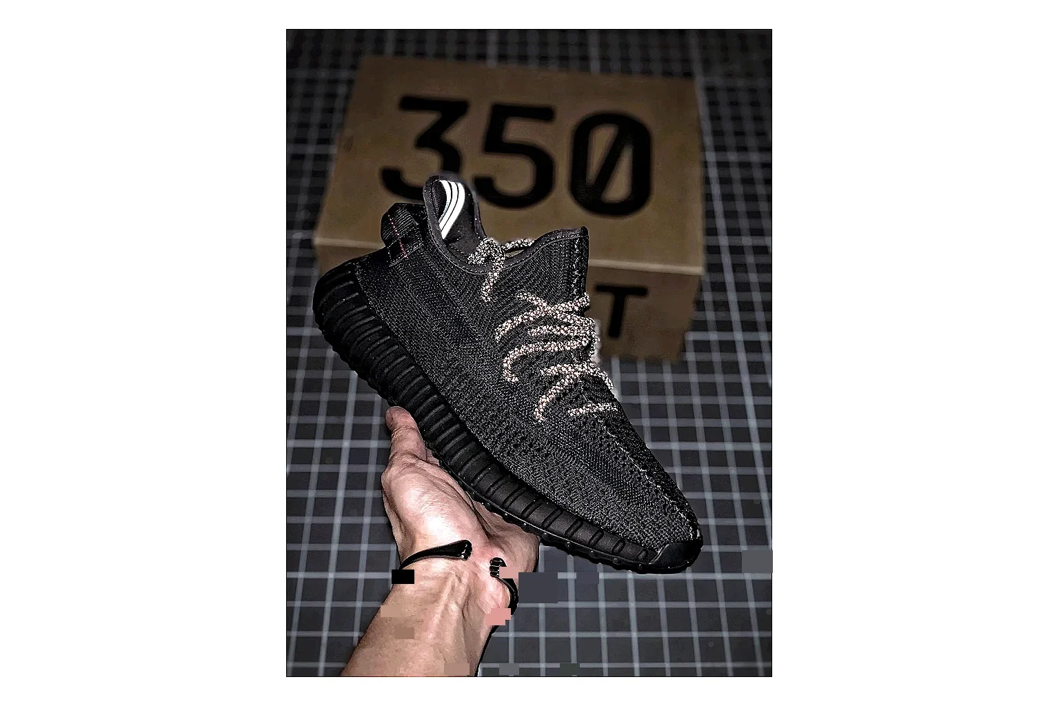 Adidas Yeezy 350 Boost Black comparison signal photo with black yeezy 350 knit runner with knit upper and knit shape