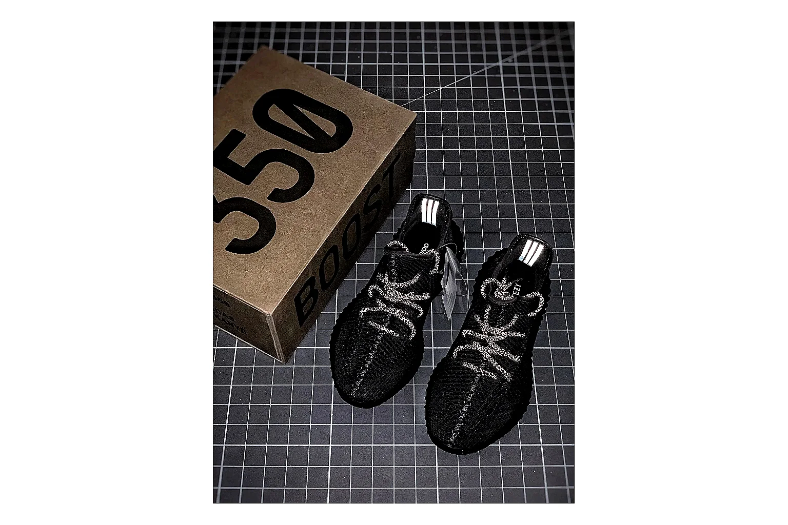 Adidas Yeezy 350 Boost Black comparison signal photo with black yeezy 350 knit runner with knit upper and knit shape thumbnail 3