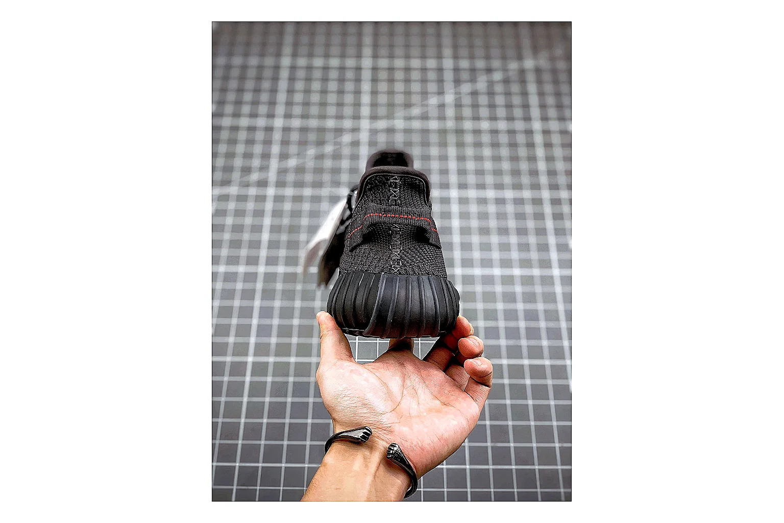 Adidas Yeezy 350 Boost Black comparison signal photo with black yeezy 350 knit runner with knit upper and knit shape thumbnail 4