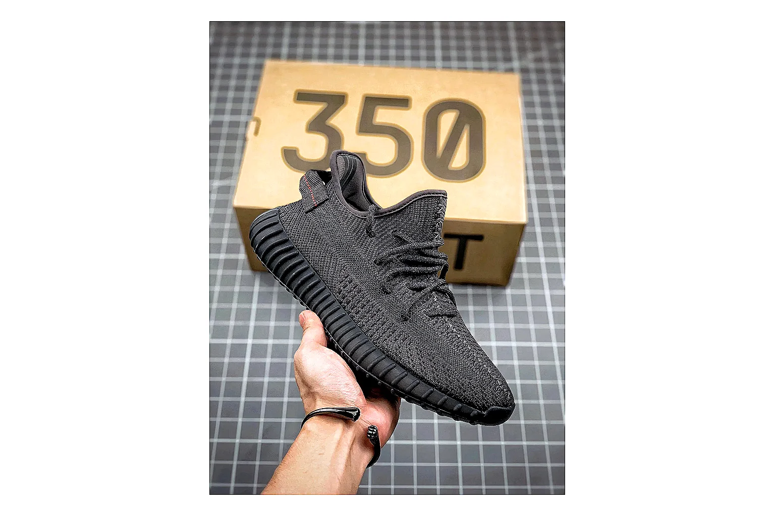 Adidas Yeezy 350 Boost Black comparison signal photo with black yeezy 350 knit runner with knit upper and knit shape thumbnail 6