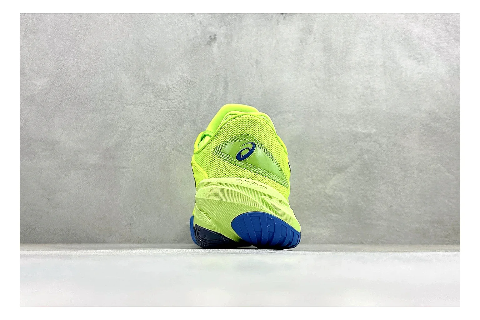 Asics Court FF Volt Blue comparison photo showing bright volt and blue court upper, supportive sole wall, Asics side lines, and stable tennis profile thumbnail 3