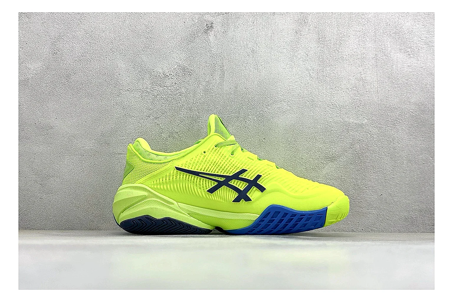 Asics Court FF Volt Blue comparison photo showing bright volt and blue court upper, supportive sole wall, Asics side lines, and stable tennis profile thumbnail 6