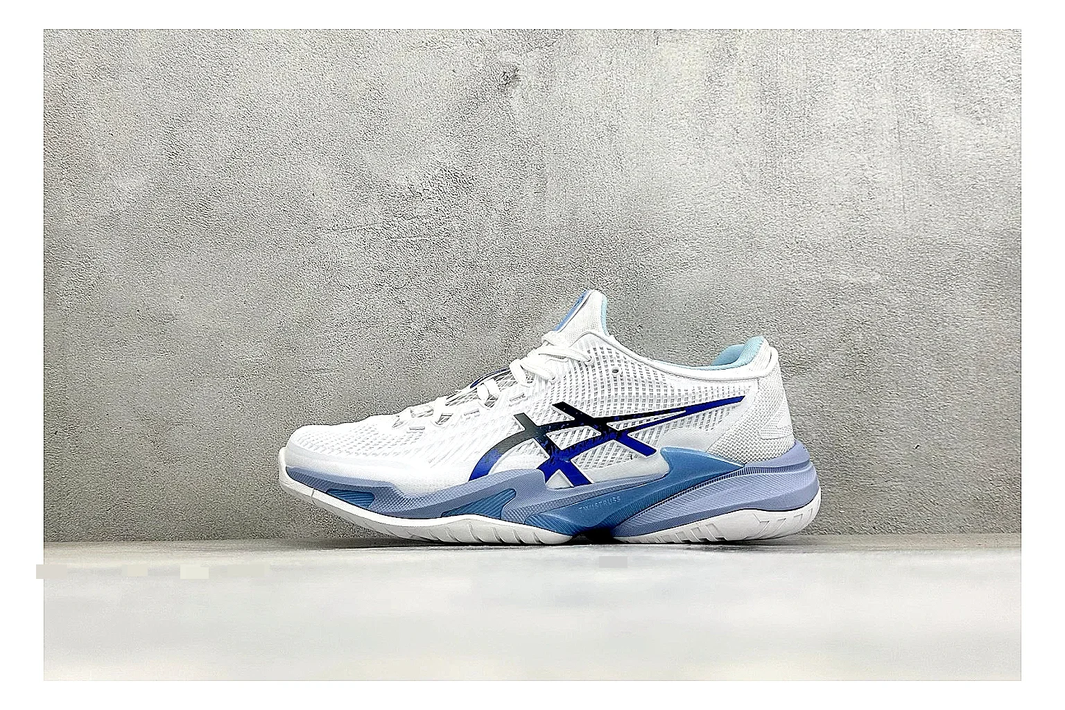 Asics Court FF White Blue comparison photo showing white tennis upper, blue Asics side lines, supportive sole wall, and stable court profile