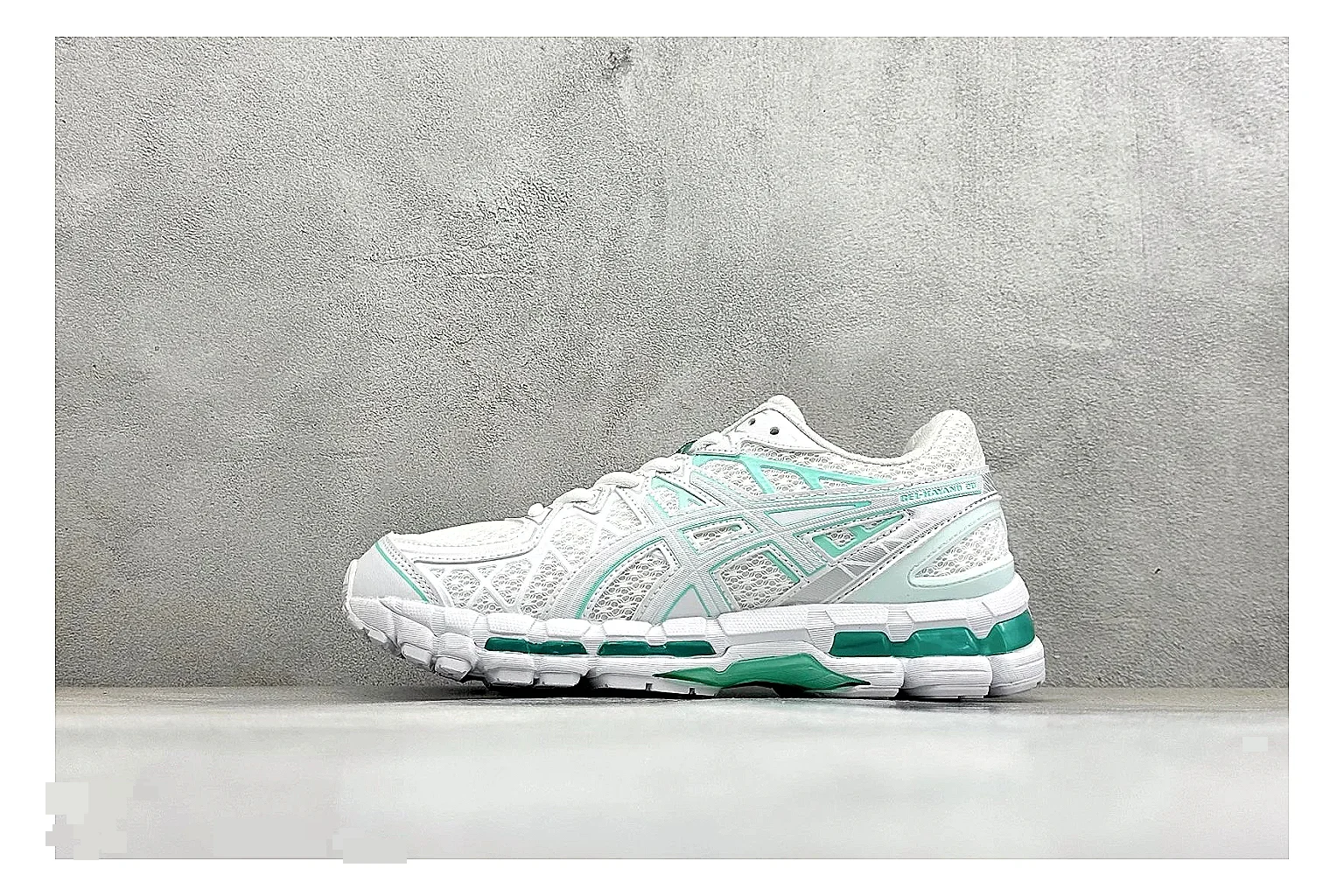 Asics Gel-Kayano White Mint comparison photo showing white mesh runner upper, mint Asics accents, cushioned Gel-Kayano sole, and technical support shape