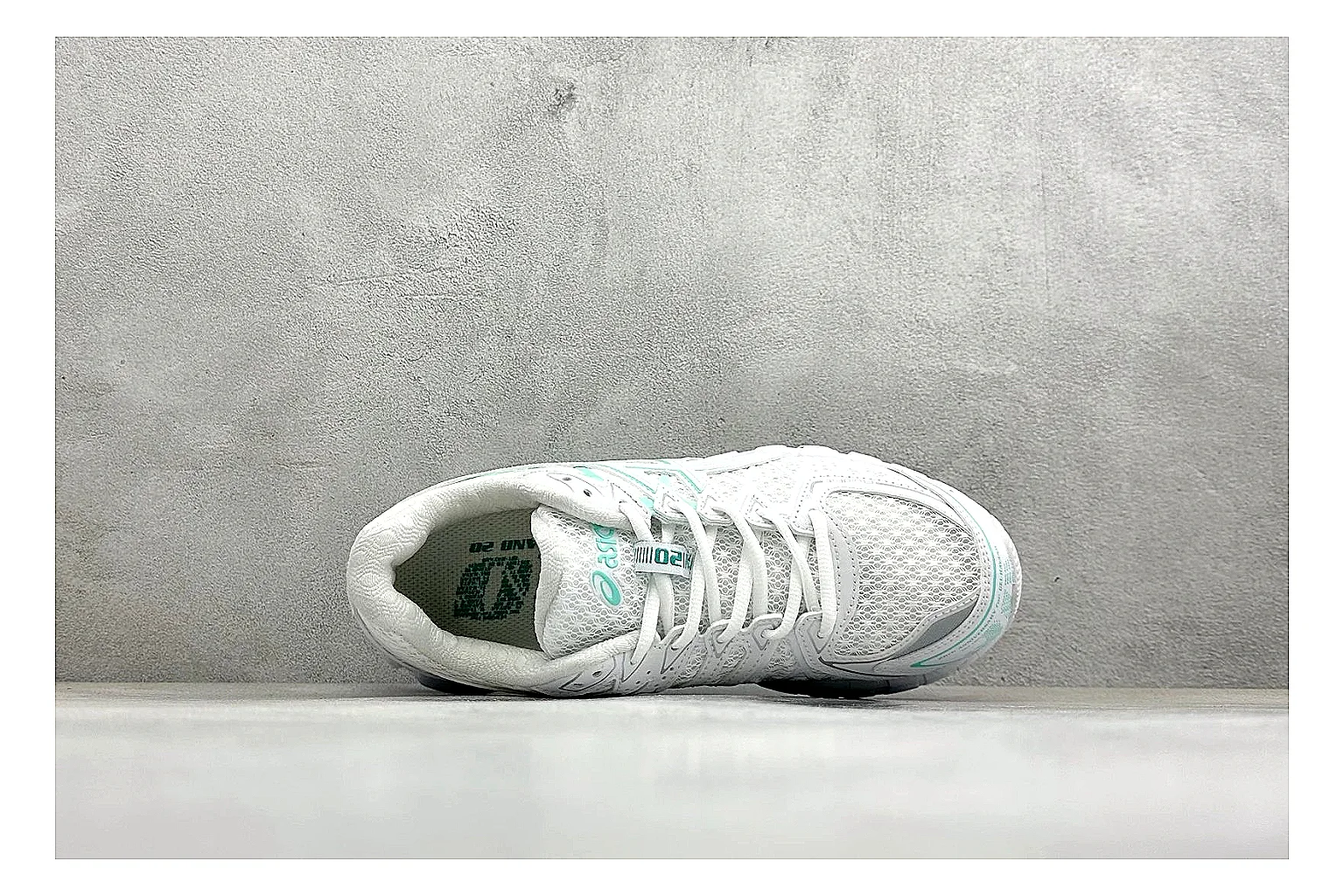 Asics Gel-Kayano White Mint comparison photo showing white mesh runner upper, mint Asics accents, cushioned Gel-Kayano sole, and technical support shape