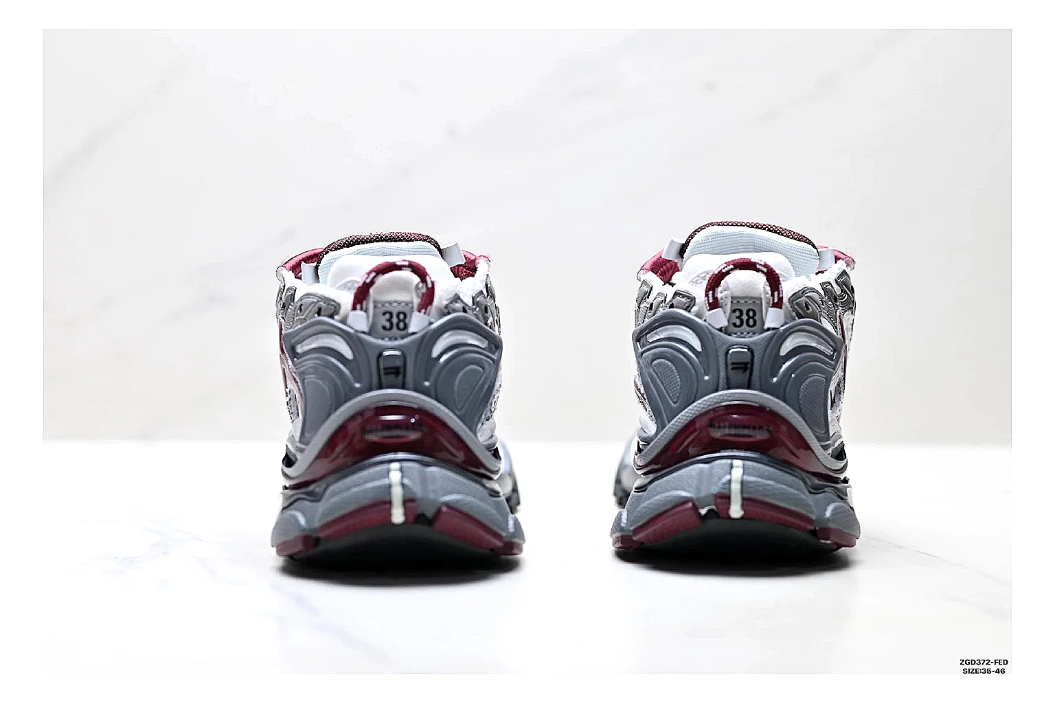Asics Gel Runner Gray Burgundy comparison photo showing gray mesh-leather runner upper, burgundy Asics accents, retro runner shape, and cushioned sole thumbnail 3