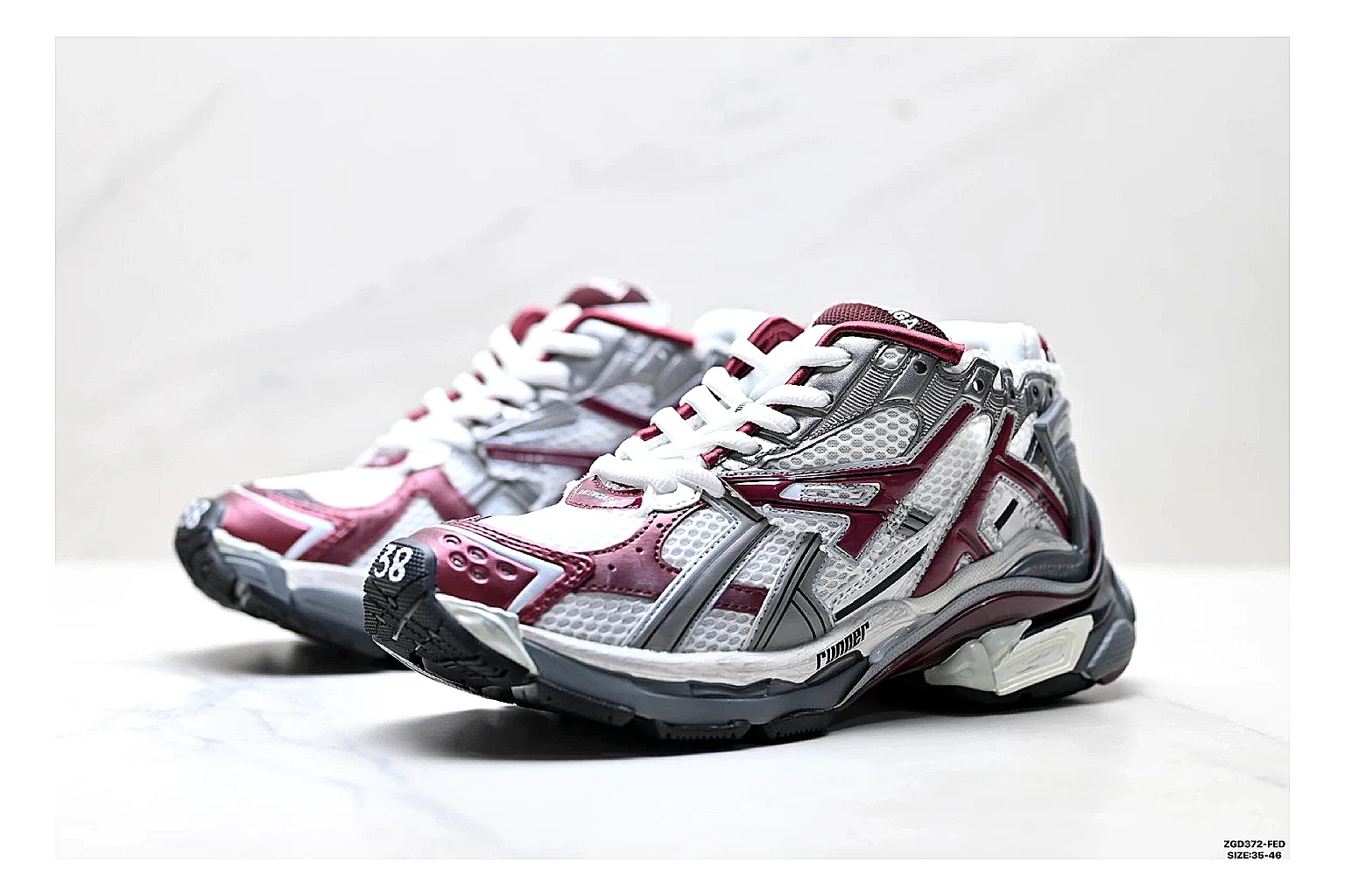 Asics Gel Runner Gray Burgundy comparison photo showing gray mesh-leather runner upper, burgundy Asics accents, retro runner shape, and cushioned sole thumbnail 4
