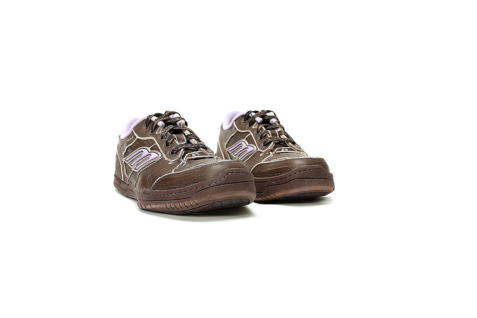 Balenciaga brown trainer front angle showing logo panels and toe shape thumbnail 5