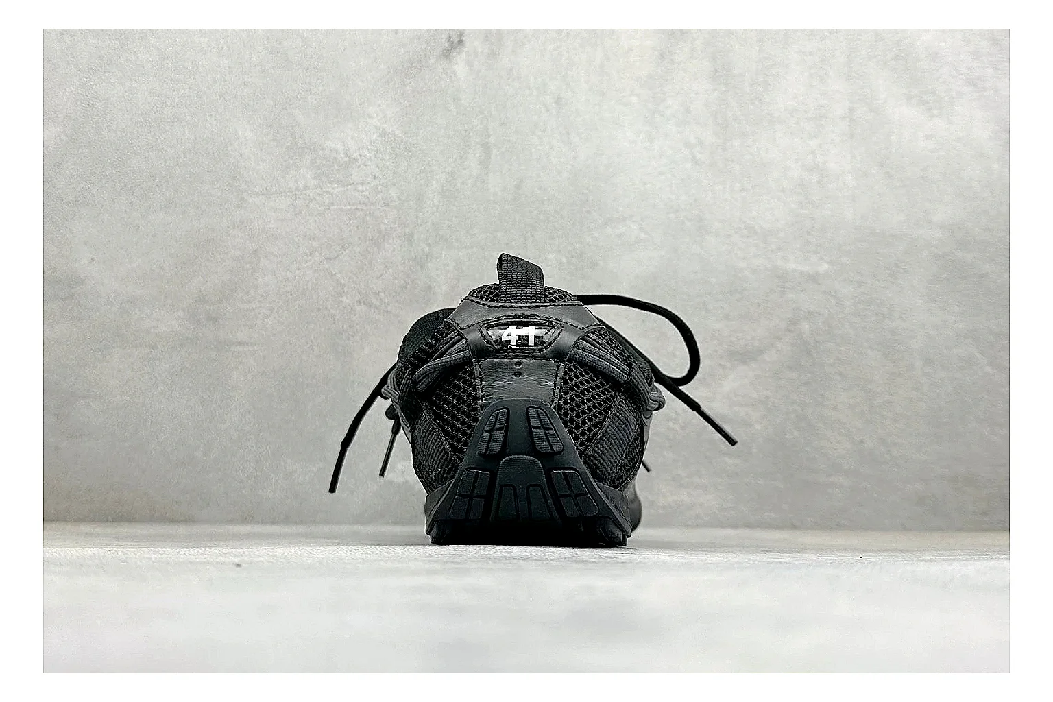Balenciaga Track Black Low-Top comparison photo showing black layered technical upper, complex paneling, chunky runner sole, and tactical low-top shape thumbnail 3