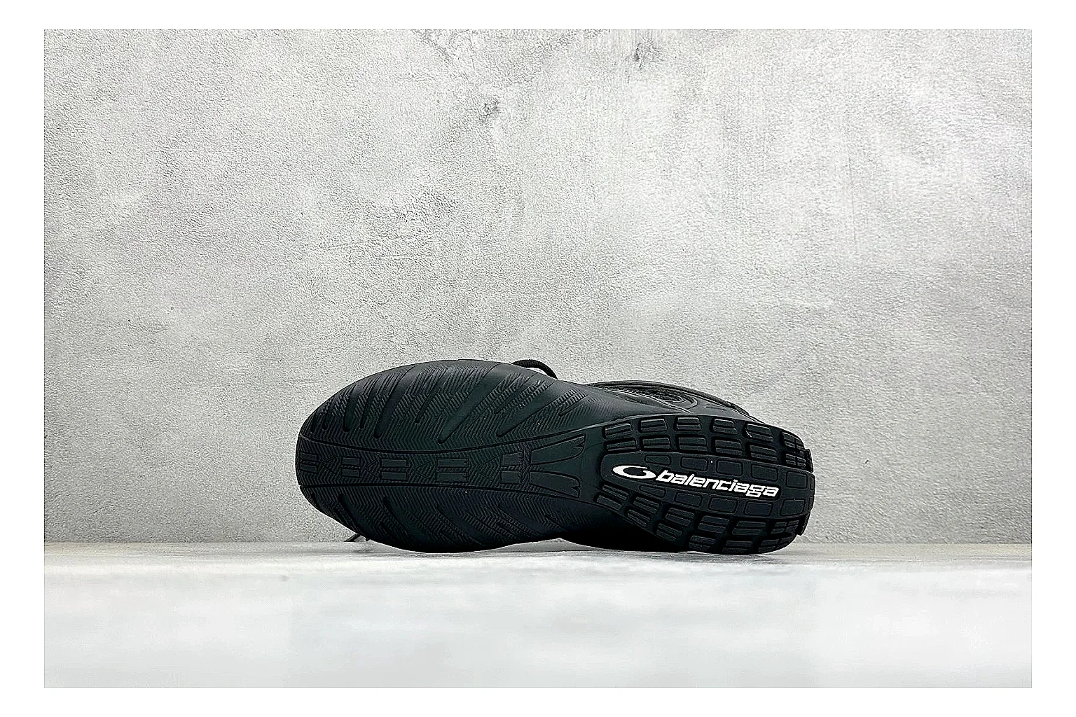 Balenciaga Track Black Low-Top comparison photo showing black layered technical upper, complex paneling, chunky runner sole, and tactical low-top shape thumbnail 4