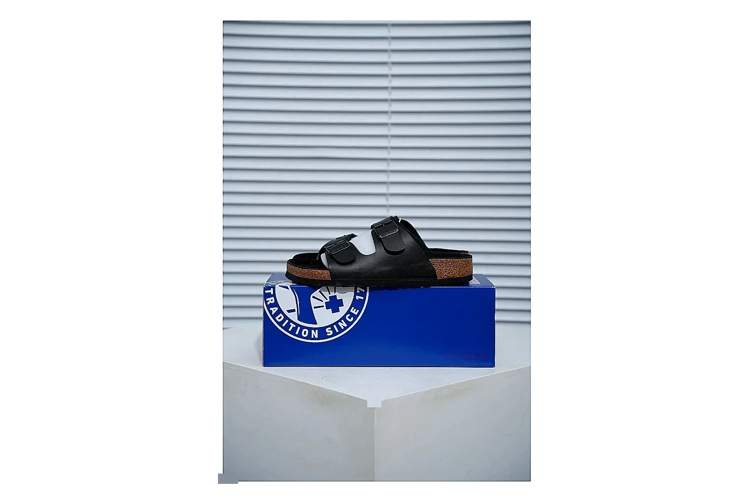Birkenstock Arizona Black Cork Slide comparison signal image with adjustable buckles, contoured footbed and dark outsole for versatile casual looks