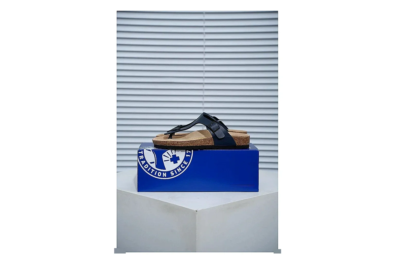 Birkenstock Black Toe Loop Cork Sandal comparison signal image with slim straps, adjustable buckle and contoured footbed for light summer wear