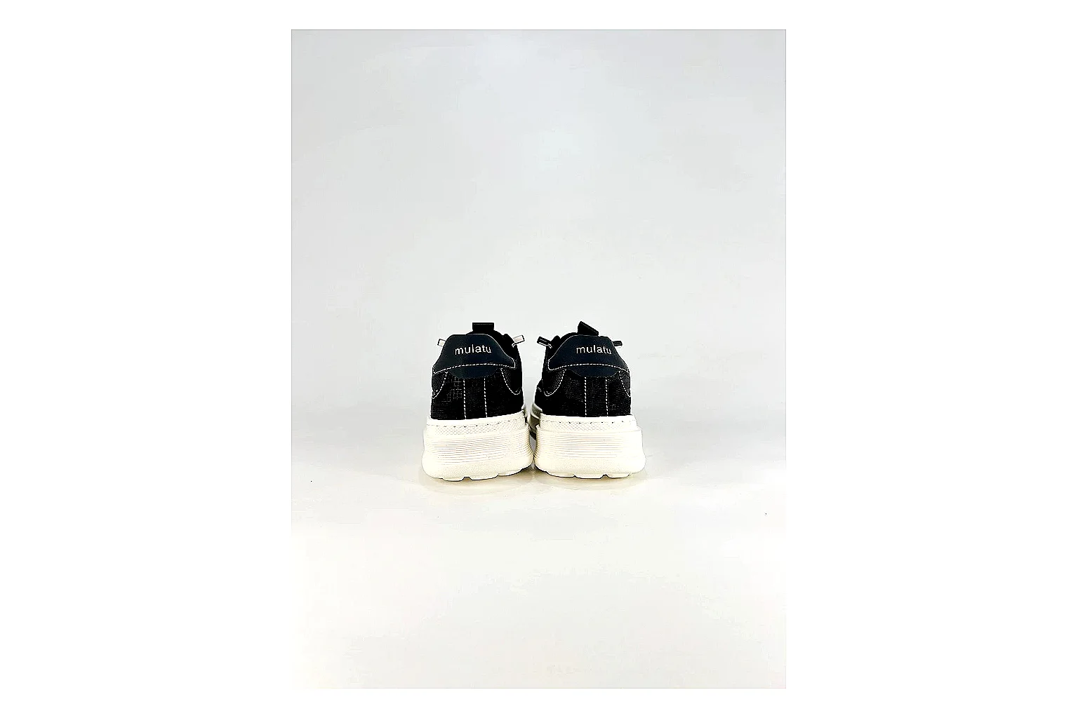 Boss Low Top Black White comparison photo showing black white leather low-top upper, minimal casual profile, clean panels, and simple rubber sole thumbnail 4
