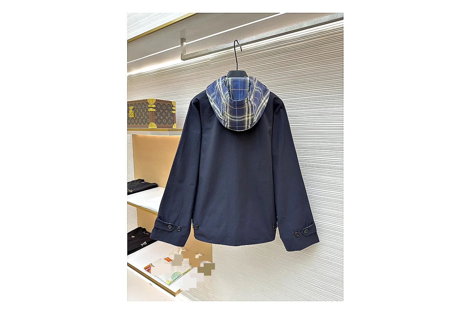 Burberry Reversible Hooded Jacket Navy Check Jacket comparison signal photo with navy reversible hooded check jacket with nylon-cotton texture, hood structure, zipper line, sleeve cuffs, and light shell shape