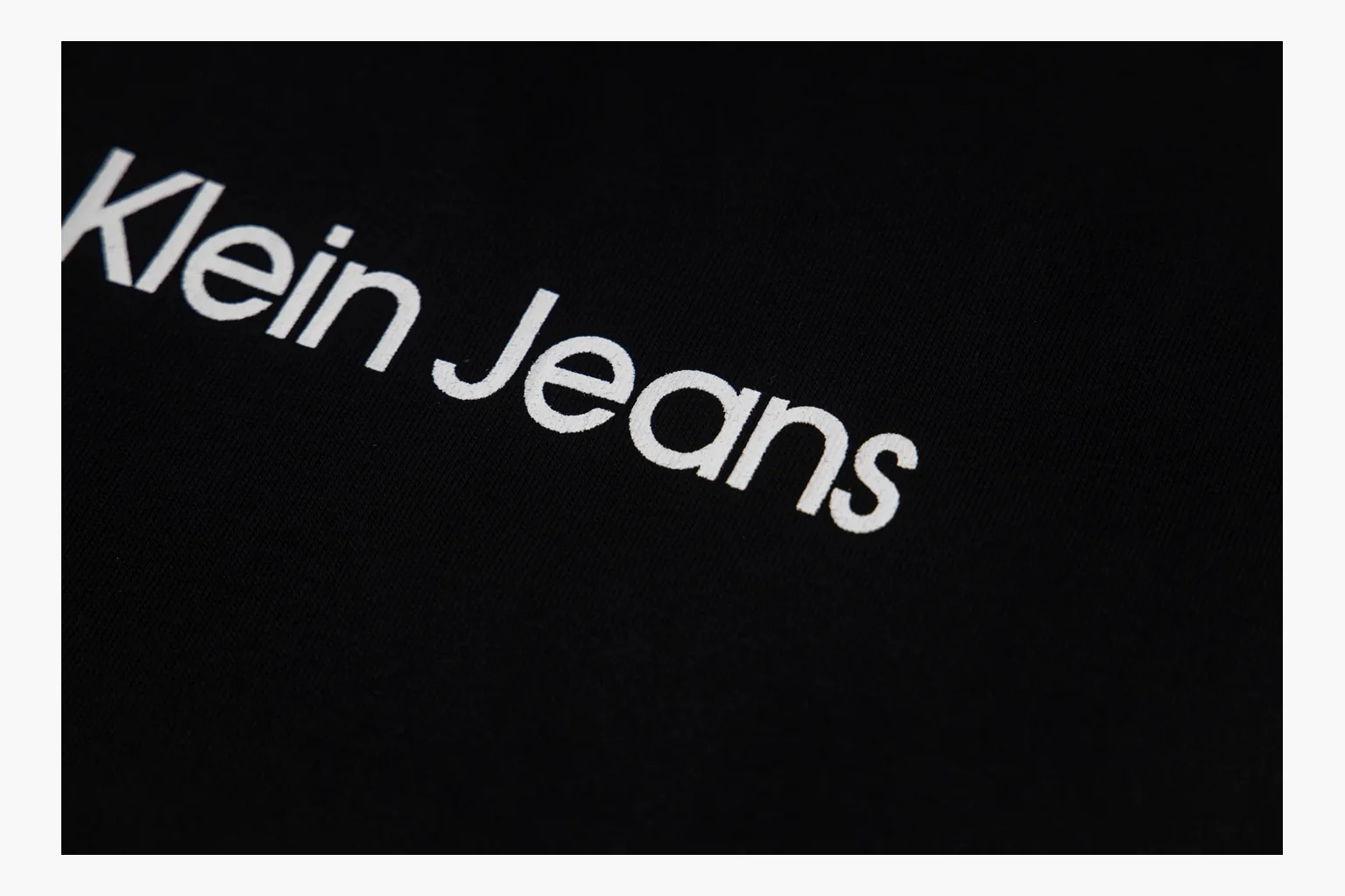 Calvin Klein black V-neck tee comparison image with print thumbnail 3