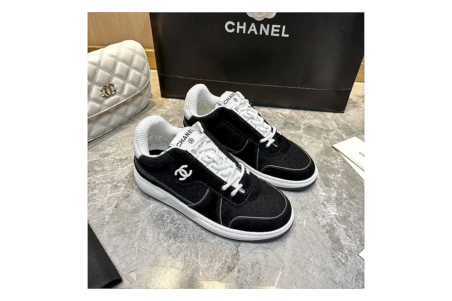 Kako Scout comparison images for Chanel Black Runner Sneaker