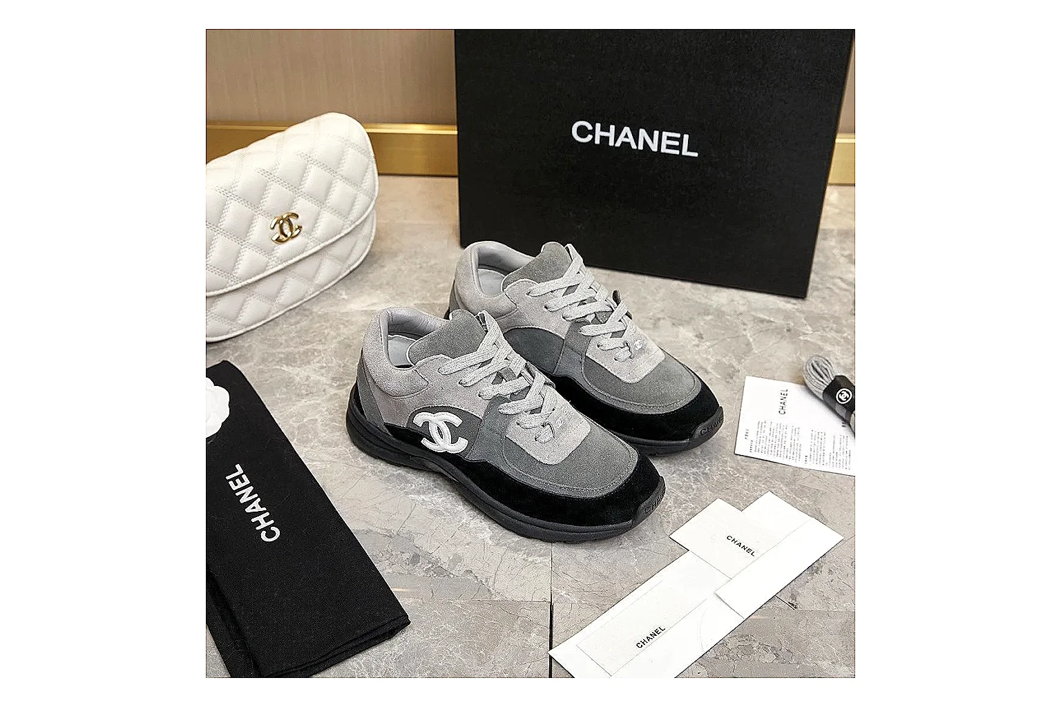Kako Scout comparison images for Chanel Black Runner Sneaker
