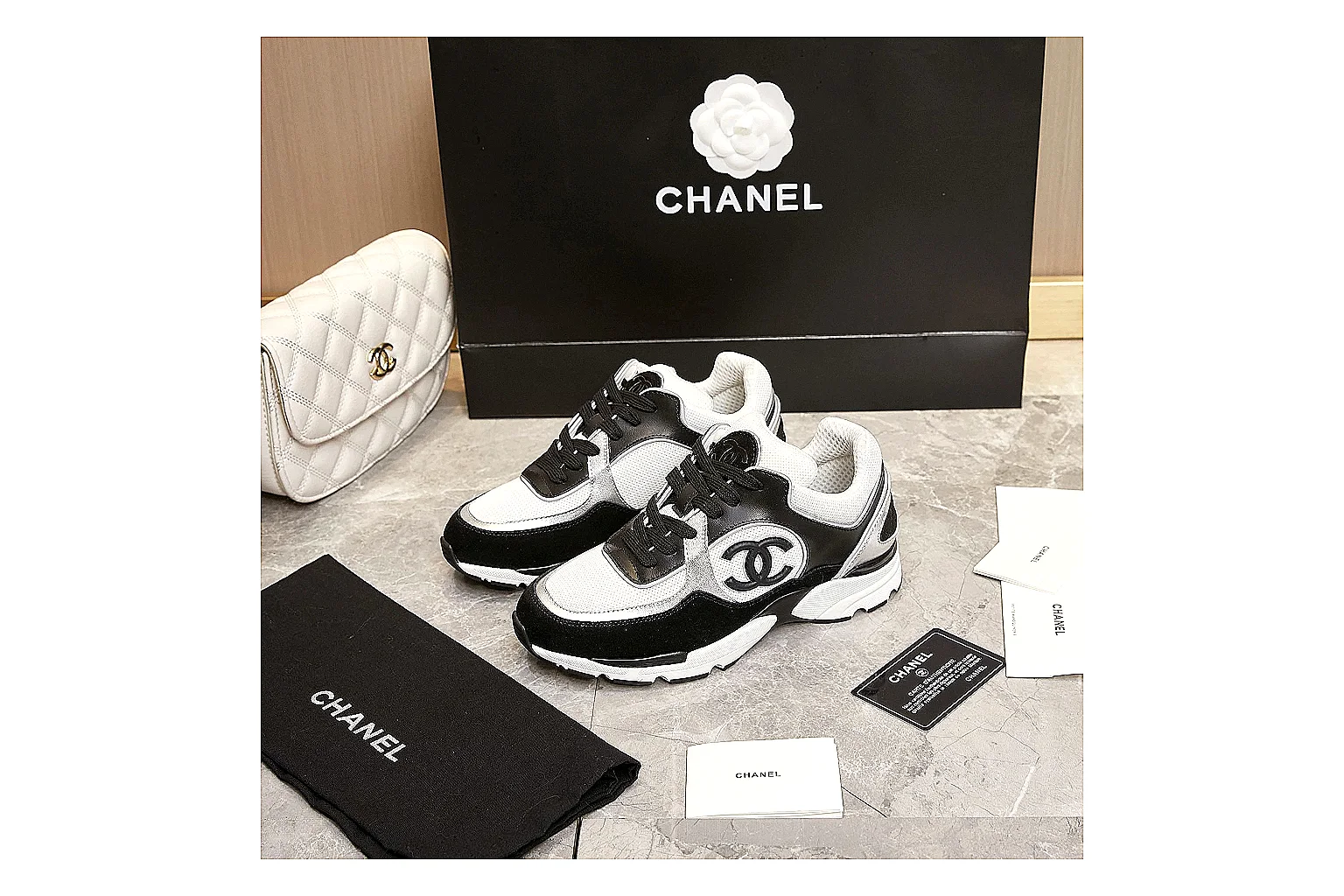 Kako Scout comparison images for Chanel Black White Runner Sneaker